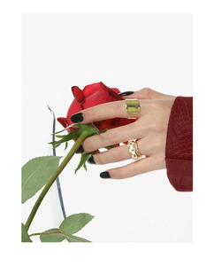 Fashionable gold rings set with irregular wide band and checkerboard pattern on hands