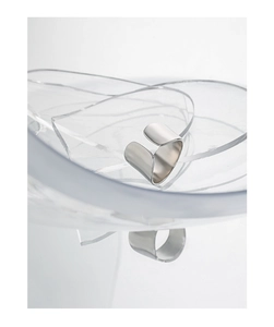 Macro detail of wide S925 sterling silver open ring on textured glass background