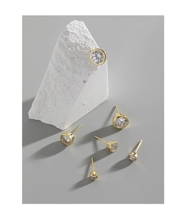 Set of five gold plated round zircon stud earrings in various sizes from 3mm to 8mm