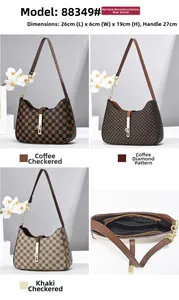 Detail view of checkerboard shoulder bags and internal compartment with zipper pocket