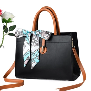 Chic black and brown crossbody bag with decorative nautical scarf and gold clasp