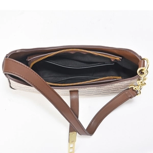 Top view of checkerboard shoulder bag showing interior zip pocket and fabric lining