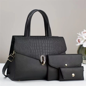 Three-piece black leather handbag set with crocodile pattern flap and gold hardware