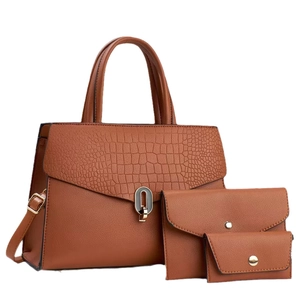 Brown faux leather 3-piece bag set with textured crocodile pattern and top handle design