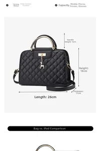 Detailed view of black quilted leather handbag showing deer charm and 26x18x11cm dimensions