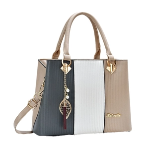Dreifarbige Patchwork PU-Leder Handtasche mit vertikalen Streifen und Quastenanhänger