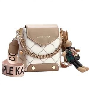 White quilted mini crossbody bag with logo strap and cute bunny doll pendant
