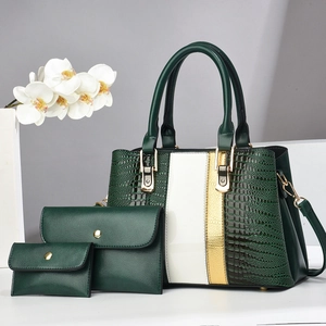 Three-piece dark green tote bag set with crocodile pattern and shiny vertical stripes