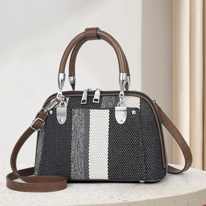 Fashion striped tote bag with brown leather trim and silver metal hardware accents