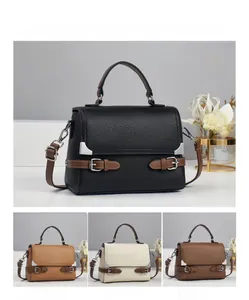 Detail view of stylish crossbody bag in multiple colors with pebbled leather texture