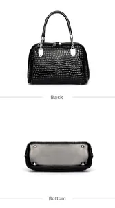 Detailed views of black faux crocodile pattern bag with metallic feet and back texture