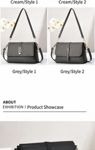 Detail view of two grey textured leather crossbody bags with different buckle designs