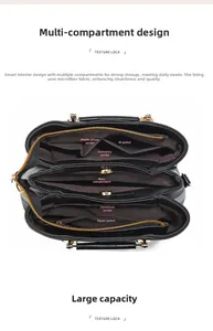 Interior view of black tote bag showing multiple compartments and microfiber lining
