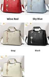Detail showing high-quality PU leather handbag variety with stone pattern and gold handles