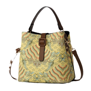 Sac seau vintage en jacquard avec motif de vagues dorées et lanières en cuir
