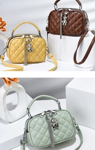 Three mini quilted crossbody bags in yellow, brown, and green with cute bear charms