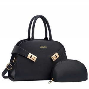 Black pebbled leather tote and pouch set with gold hardware on a clean white background