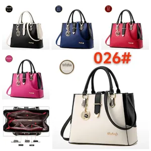 Detailed view of women's handbag interior pockets and multi-color synthetic leather selection
