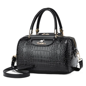 Classic black crocodile pattern Boston handbag with gold kangaroo logo and top handles