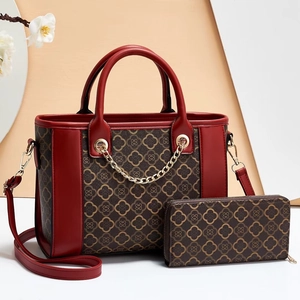 Elegant burgundy floral tote bag and matching long wallet set with gold chain detail