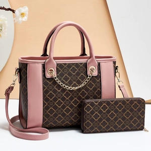 Brown and pink tote bag set with clover pattern and matching long zipper wallet