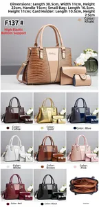 Détail ensemble de 3 sacs motif crocodile avec sac à main, pochette et porte-cartes