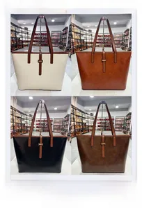 Dettaglio di grandi borse tote in quattro colori con dimensioni e astuccio incluso
