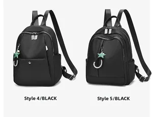 Comparación de dos mochilas negras de tela Oxford con colgantes de estrella y correas tejidas