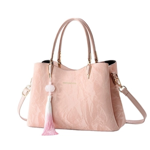 Rosa Handtasche im chinesischen Stil mit Plissee-Leder und Quastenanhänger für Damen