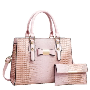 Pink crocodile pattern tote bag set with bow decoration and matching wallet