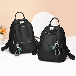Sac à Dos Femme en Tissu Oxford Grande Capacité Imperméable Sac de Voyage Décontracté Avec Pendentif Étoile Sac d'École Noir
