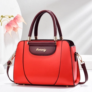 Minimalist red colorblock handbag with Danbaoly logo and elegant crossbody strap