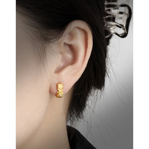 Irregular lava texture gold plated 925 silver hoop earrings with a minimalist aesthetic