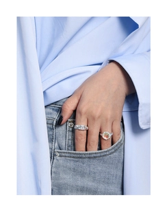 Close-up of S925 sterling silver rings with moonstone and square zircon details