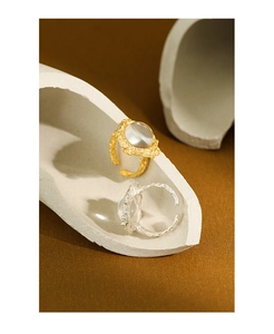 Macro view of textured S925 silver rings with large translucent quartz stones