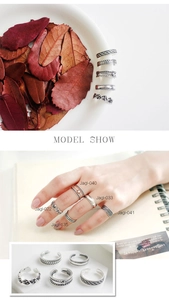 Detailed view of S925 sterling silver ring set featuring intricate woven patterns