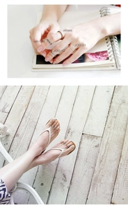 Detailed view of S925 silver retro braided rings and daisy toe rings in silver and gold