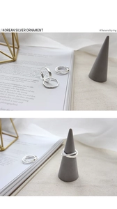 Detailed view of S925 sterling silver interlocking double ring in a minimalist style