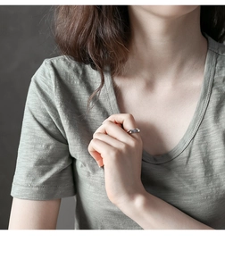 Minimalist S925 sterling silver double-layer criss-cross ring worn on the finger