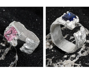 Macro detail of S925 sterling silver rings with lava texture and colored zircon stones