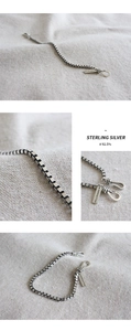 Λεπτομέρεια από vintage βραχιόλι S925 sterling silver με ανάγλυφο κούμπωμα και αλυσίδα