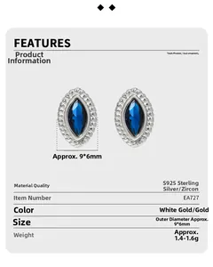 Detail of S925 silver twist border earrings with marquise-cut blue zircon stones