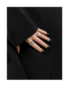 Detail showing an S925 silver open ring with a round labradorite stone on a model hand
