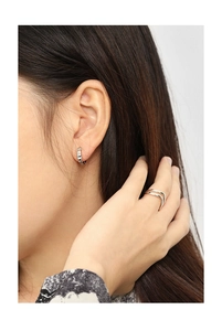 Detail view of S925 sterling silver geometric earrings and minimalist double-layer ring