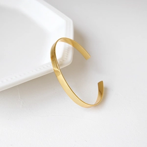 Minimalist S925 sterling silver open cuff bracelet with polished golden finish