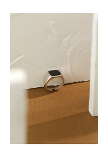 Detailed close-up of S925 silver geometric ring with square black resin inlay on stone