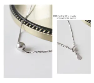 Macro view of S925 sterling silver bead pendant with hallmark on the jewelry clasp