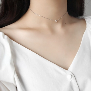 Minimalist S925 sterling silver choker necklace featuring a polished round bead pendant