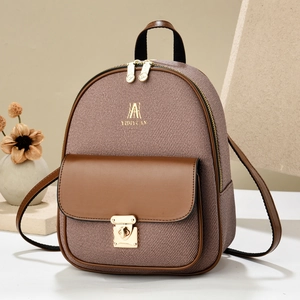 Vintage brown mini backpack for women with leather trim and gold metal buckle