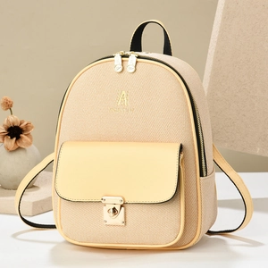 Elegant oatmeal beige woven backpack with gold hardware for travel and daily use